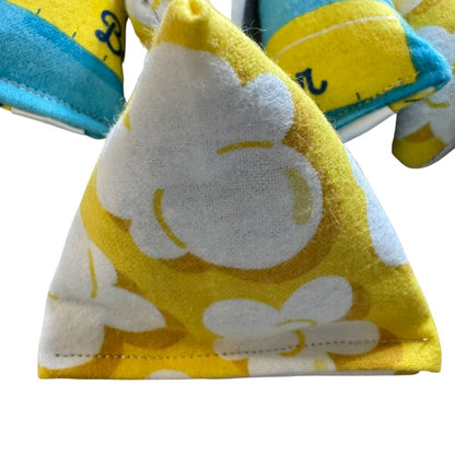 Side view of durable popcorn themed cat toy designed for batting and pouncing