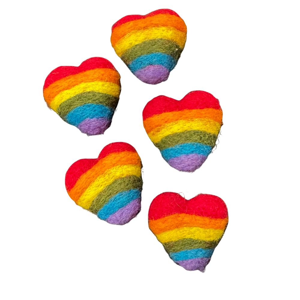 Felted rainbow heart cat toy sprayed with catnip, handmade by CatnipTakeout for batting, tossing, and play