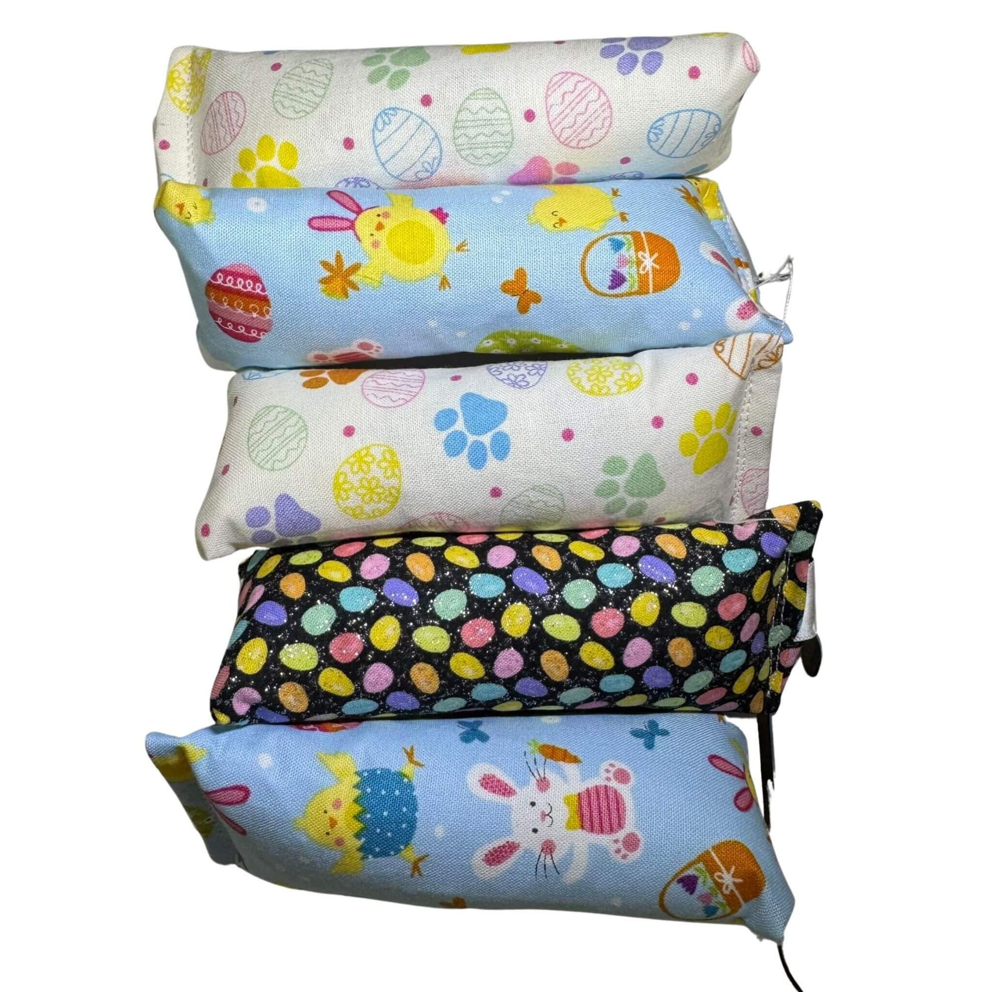 Set of mini kicker catnip toys with spring bunny and chick fabric prints in soft pastels. Crinkle or no crinkle. Made by CatnipTakeout.