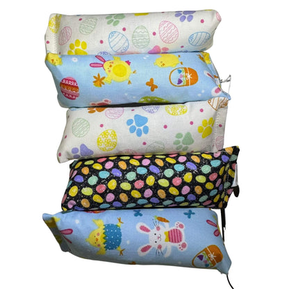 Set of mini kicker catnip toys with spring bunny and chick fabric prints in soft pastels. Crinkle or no crinkle. Made by CatnipTakeout.