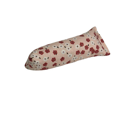 Blush pink mini kicker cat toy with tiny red floral print, filled with catnip for compact solo play sessions