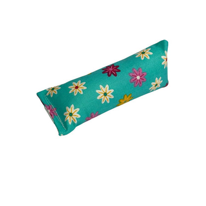 Teal mini kicker cat toy with colorful daisy print, filled with catnip for batting, grabbing, and bunny kicks