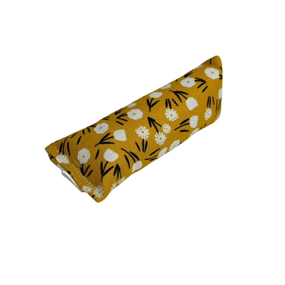 Golden mustard mini kicker cat toy with white blooms and dark stems, filled with catnip for batting play