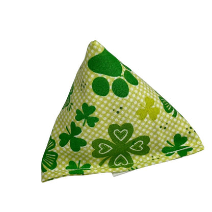 Light green pyramid catnip cat toy with clovers and paws details on cotton, filled with catnip for self play