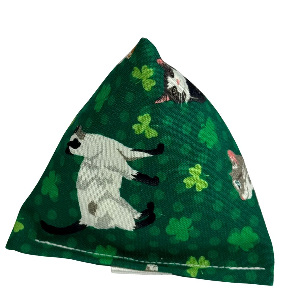 Pyramid catnip cat toy with illustrated lucky cats and shamrocks on deep green cotton fabric