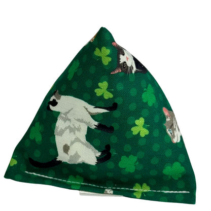 Pyramid catnip cat toy with illustrated lucky cats and shamrocks on deep green cotton fabric