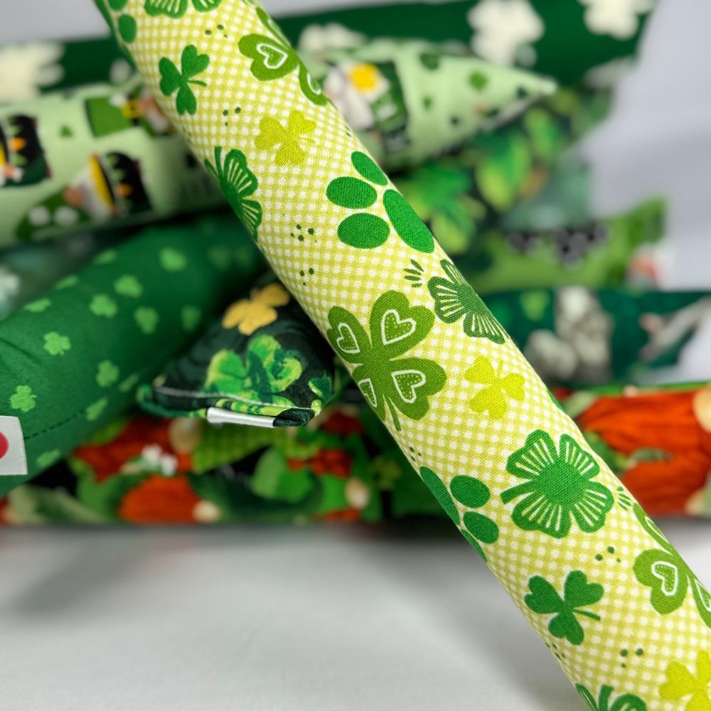 Group photo of St. Patrick’s Day kicker cat toys with shamrocks, clovers, and green patterns for bunny kicking play