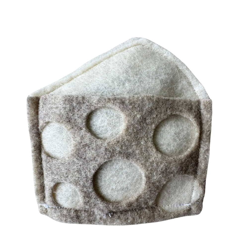Swiss cheese cat toy filled with catnip for tossing, batting, and indoor enrichment