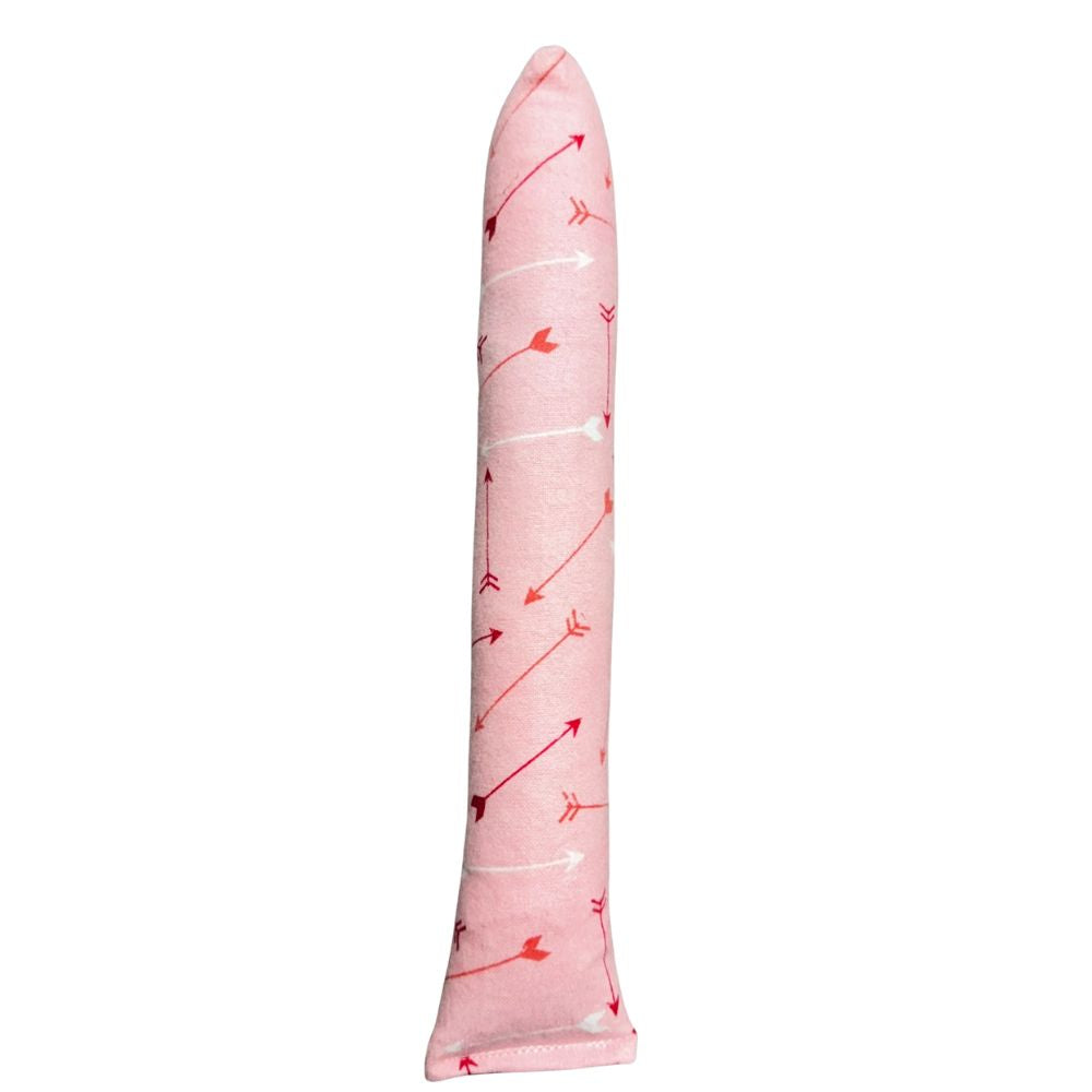 Close-up photo of one handmade Valentine arrows Kicker cat toy in a soft pink arrows pattern, long shape, filled with signature premium catnip. Made by CatnipTakeout.