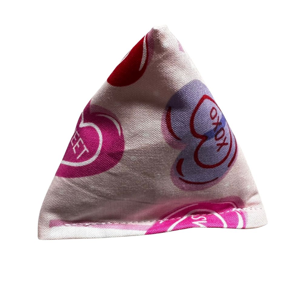 Single handmade Valentine lollipop Happy Sack cat toy in pyramid shape with heart candy design, filled with premium catnip for batting and pouncing. Made by CatnipTakeout.