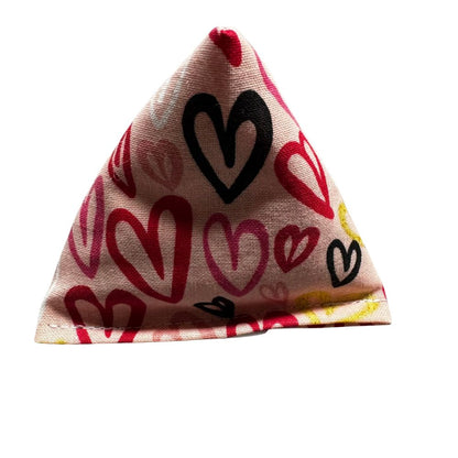 Close-up photo of one handmade Valentine scribble hearts Happy Sack cat toy in a multicolor hearts pattern, pyramid shape, filled with signature premium catnip. Made by CatnipTakeout.