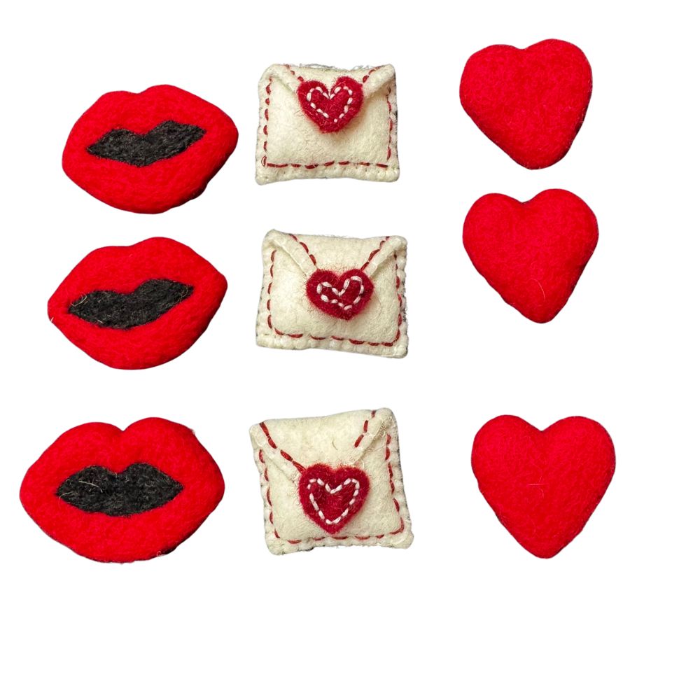 Handmade wool envelope cat toy with stitched red heart seal, felted white wool texture, sprayed with signature catnip. Wool cat toy by CatnipTakeout.